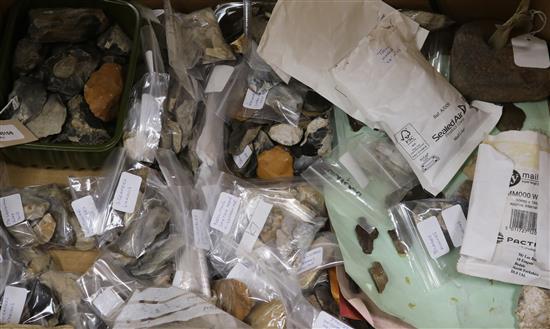 A stone fishing/loom weight and a large collection of prehistoric flint tools,
